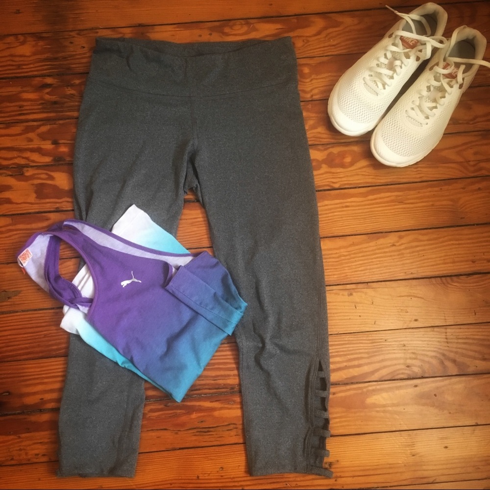 Champion grey workout leggings with cutouts.